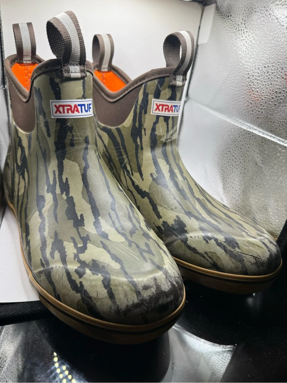 Men’s These are the XTRATUF Men's Mossy Oak Bottomland Ankle Deck Boots, featuri